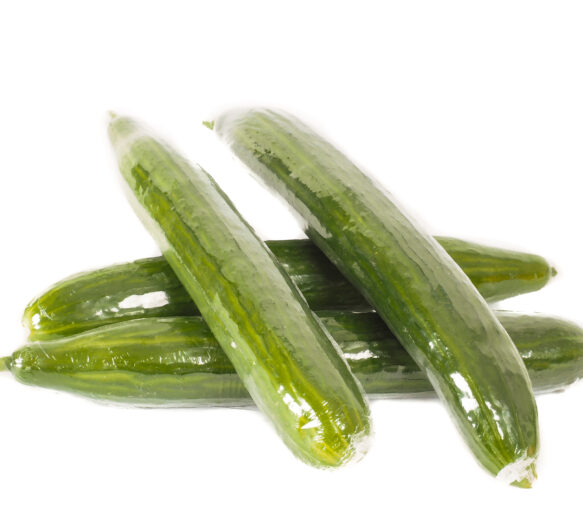 Cucumbers in heat shrink film on white